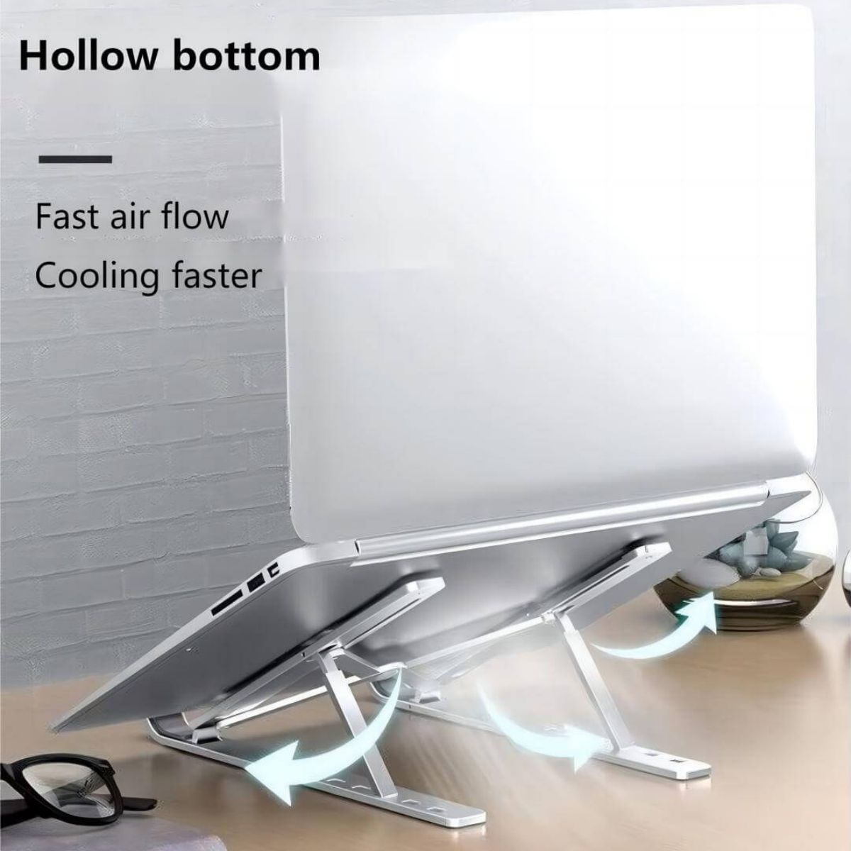 Z34 Laptop Stand with hollow bottom design for improved airflow. Enhances cooling efficiency and prevents overheating during use.
